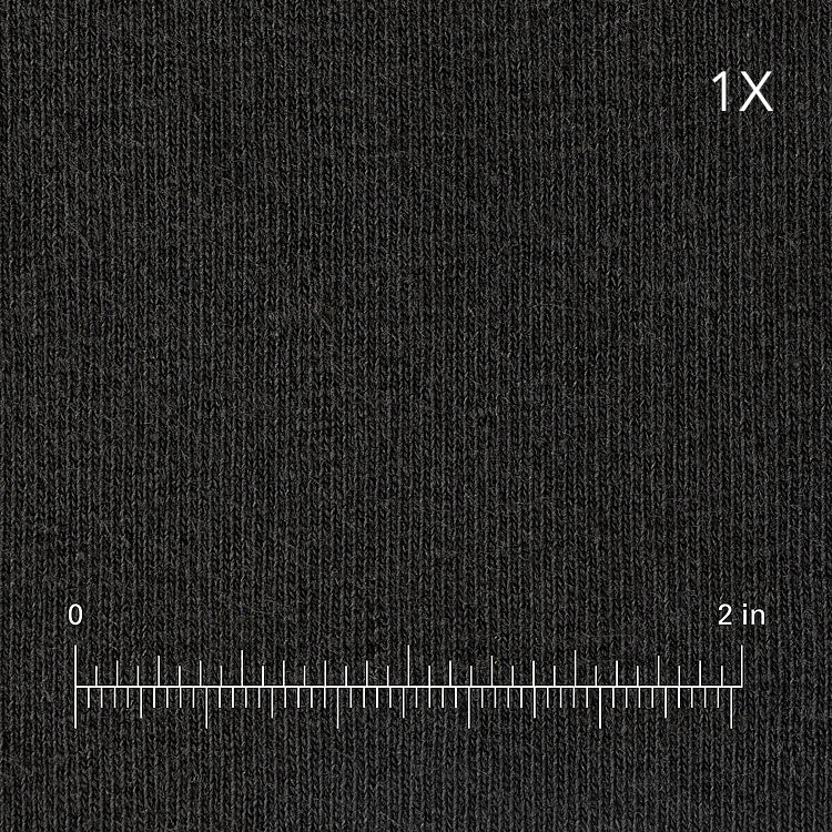 Black fabric swatch with a measurement scale at the bottom